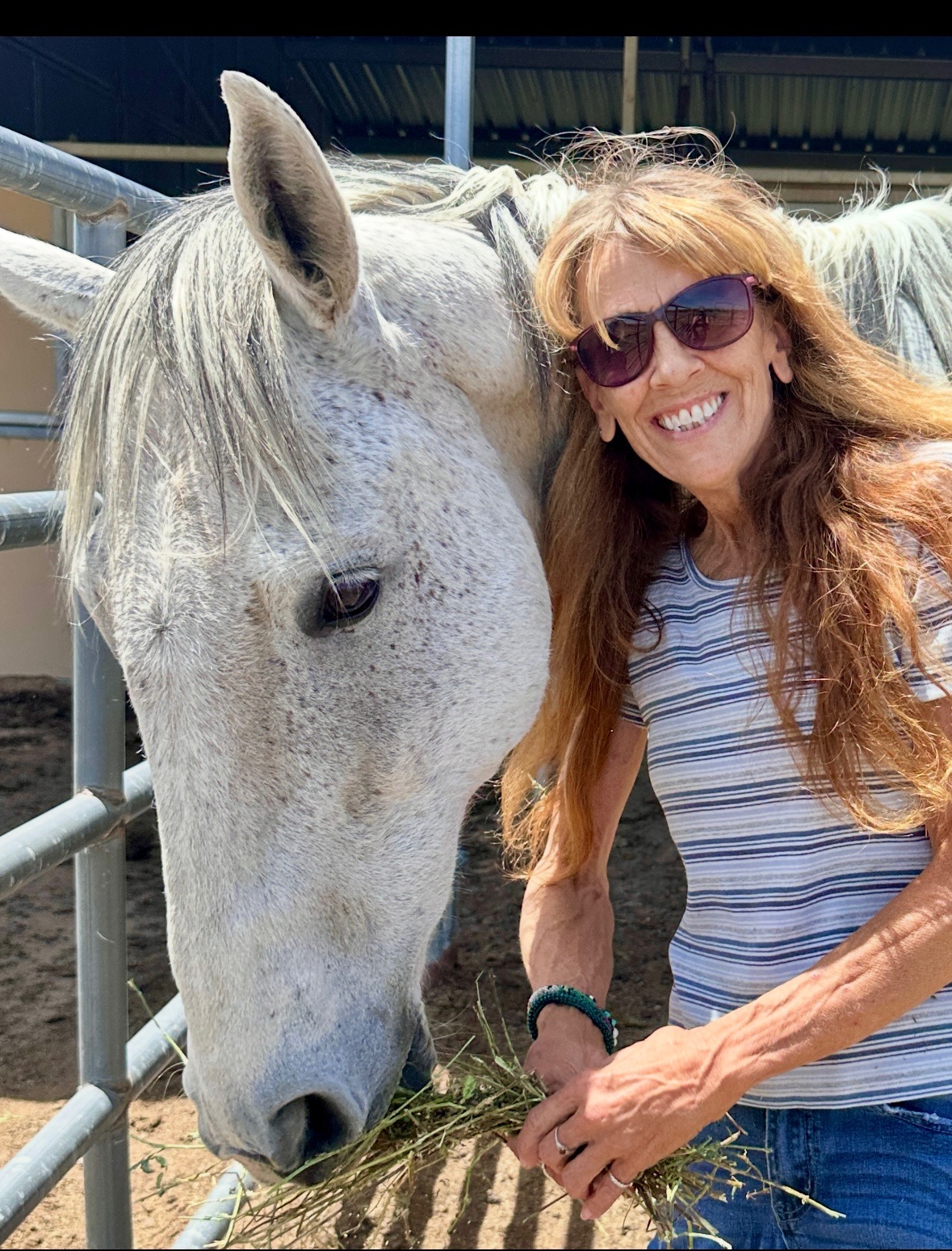 Candice with a horse at Journey With Equus